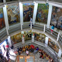The museum inside of the statue with murals showing Morelos' life